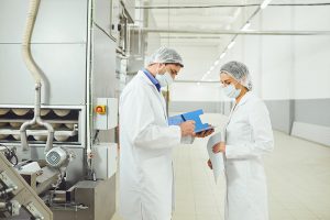 2 persons administering the quality inspection